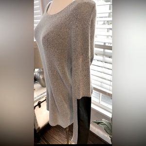 Sweater with faux leather sleeve accents